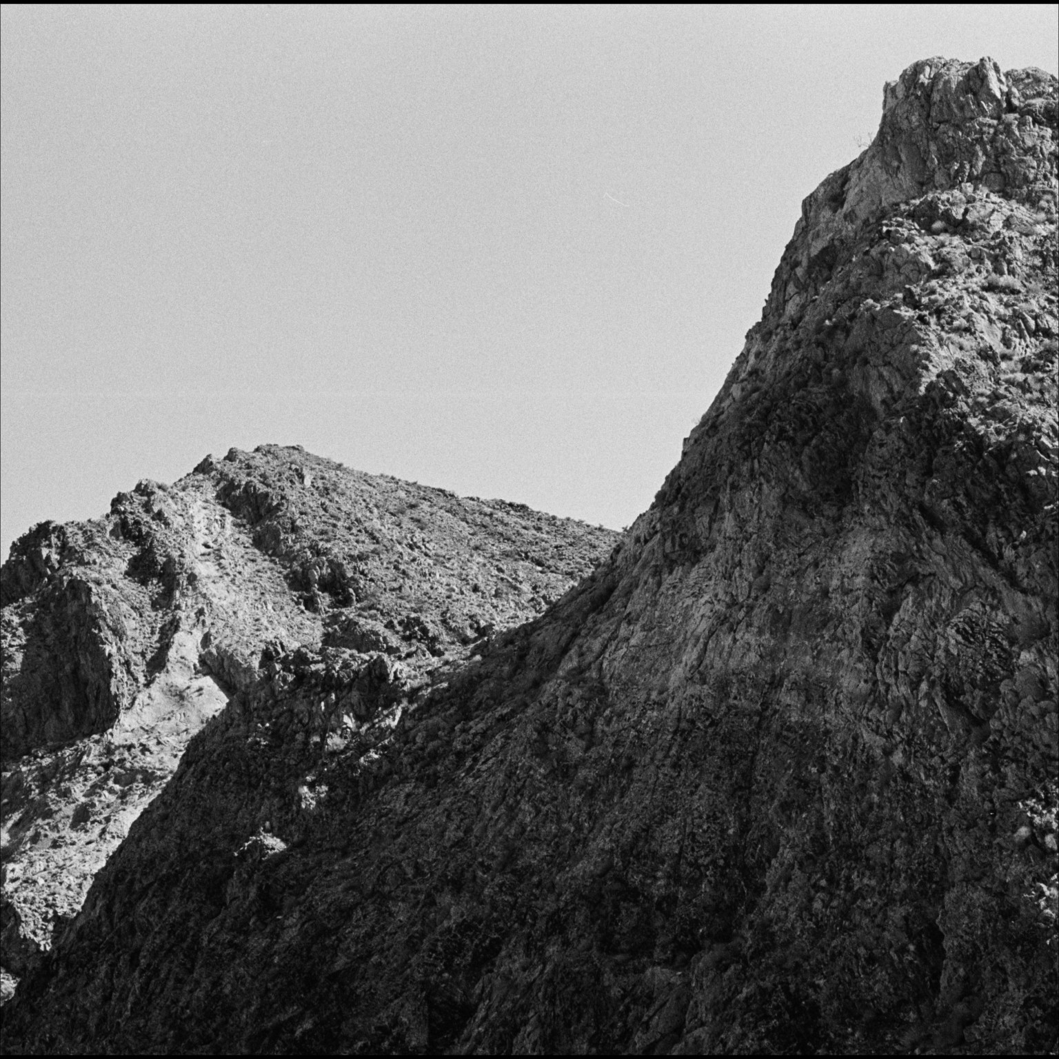 Black-and-white mountain artwork for the self-titled Vulgent EP